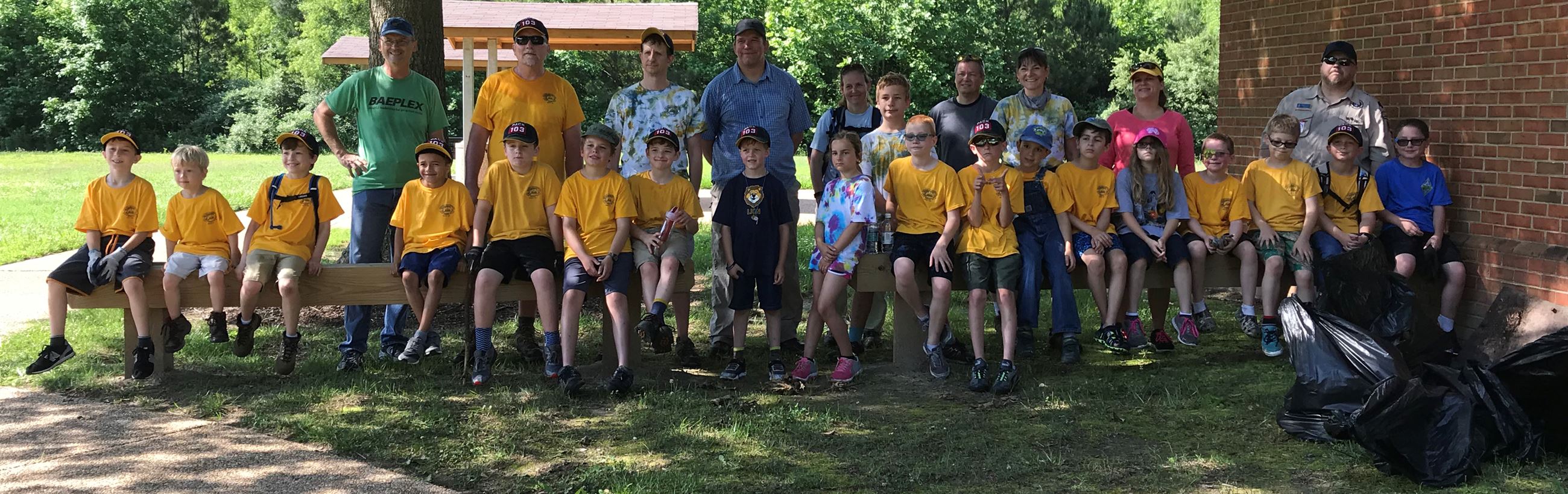 Boy Scouts participating in clean up efforts at Charles Brown Park